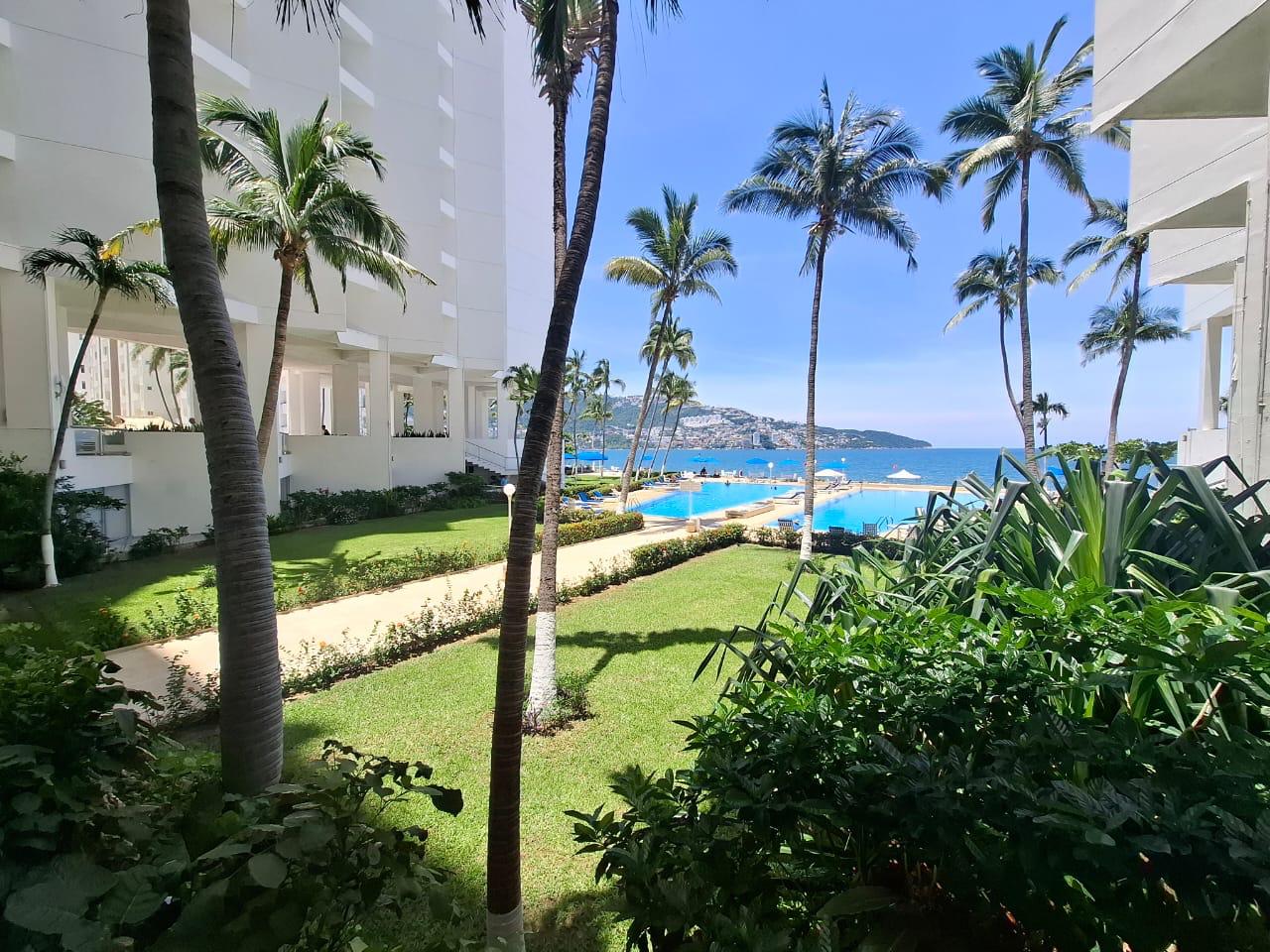 The garden, pool and Icacos Beach